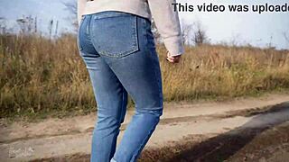 milf walking outdoors in loose jeans with her phat ass