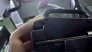 horny beauty masturbates in fit gym massaging pussy and squirting on bench