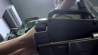 horny beauty masturbates in fit gym massaging pussy and squirting on bench