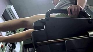 horny beauty masturbates in fit gym massaging pussy and squirting on bench