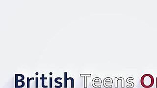 two hot posh lesbians play and use a strap-on dildo