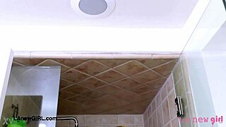 Lovely teen brunette relaxes in a soothing shower