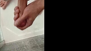 Blonde Blue-Eyed Bodybuilder Showers Muscular Body While Stroking Huge Cock