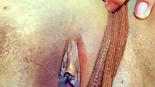 Stepdaughter masturbating to orgasm in shorts.