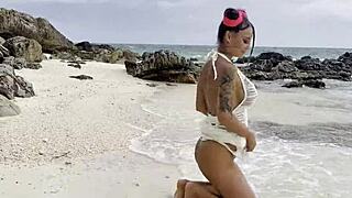 monika fox swims in the sea and fucks her pussy with a big dildo on a white sand beach