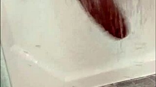 Blonde Blue-Eyed Bodybuilder Showers Muscular Body While Stroking Huge Cock