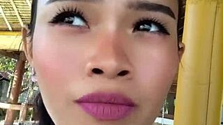 Beauty gives speech and shows off huge dildo.