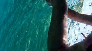 Beauty gives speech and shows off huge dildo.