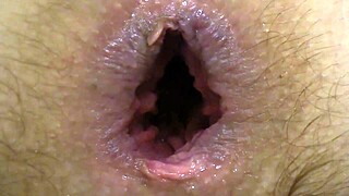 intriguing homemade fetish with asshole gaping, anal masturbation using wide dildo, and hairy pussy fingering leading to orgasm