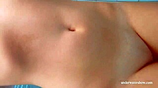 Big natural tits babe Lola swims underwater seductively