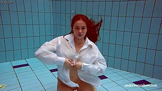 Big natural tits babe Lola swims underwater seductively