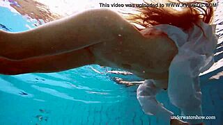 Big natural tits babe Lola swims underwater seductively
