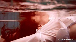 Big natural tits babe Lola swims underwater seductively