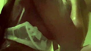 Sucking shoe plugg in front of the fridge.