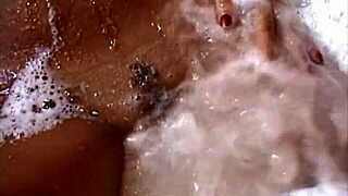 Naughty Brunette Shows Off in Bar and Bathtub