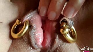 nippleringlover horny mother rubs her pierced pussy clit with extreme nipples close up
