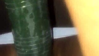 kissesxxx plays with cucumber outdoors