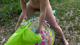 Hairy pussy milf indulges in outdoor beach fetish with inflatable toys