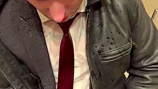 Kinky office suit in leather for men at play.