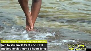 Giggles' feet get wet at the beach on Beat2feetcom!