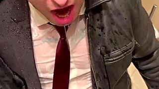 Kinky office suit in leather for men at play.