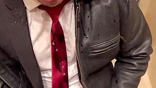 Kinky office suit in leather for men at play.