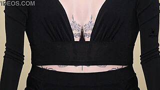 Kit Summers' Deep Plunging Black Two-Piece Neck Tease