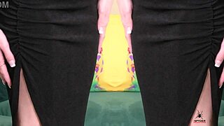 Kit Summers' Deep Plunging Black Two-Piece Neck Tease