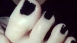 Polish lesbian worships her own black nail polish feet intimately