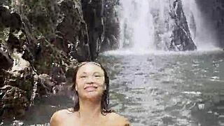 monika fox struts jungle trails flashing pierced nipples under pink top shorts