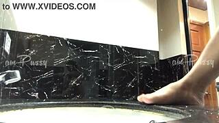 amateur babe shaves her smooth pussy closeup in sink