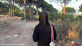 damn this lebanese hottie rubs her pussy outdoors on huge colorful dildo till she squirts wild