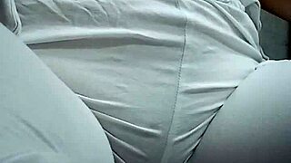 check her out squatting low while making a steamy puddle on the floor