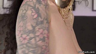 bound busty slave screams as dominatrix straps her ass hard