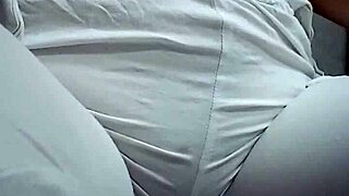 check her out squatting low while making a steamy puddle on the floor