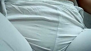 check her out squatting low while making a steamy puddle on the floor