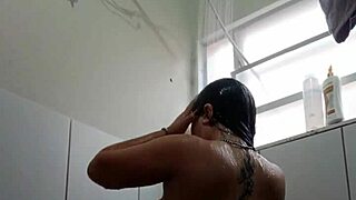 wet and ready in the bath, toy sliding into her brazilian pussy and ass...