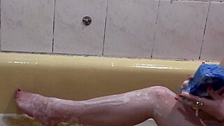 Beautiful Cute Brunette Assol Bathes with Soapy Wet Pussy Boobs
