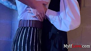 She gets caught behind bars, thighs clamping down in arcane lesbian strapon parody