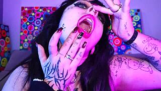 Submissive chubby goth Deedee Love spits on pierced tits and begs for cum