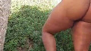 She fingers her big pussy outdoors until squirting wildly everywhere