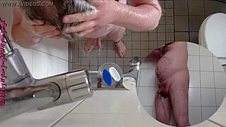 Naughty german babe pisses wildly in steamy shower