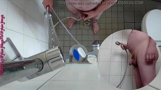 Naughty german babe pisses wildly in steamy shower