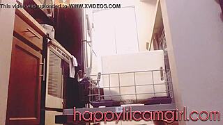 giantess girl cleans kitchen while ignoring your tiny gaze on webcam