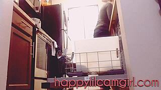 giantess girl cleans kitchen while ignoring your tiny gaze on webcam