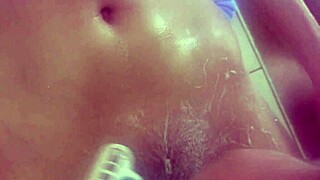 shaving my wet shaved pussy smooth for you in the bath shower