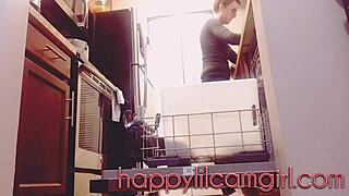 giantess girl cleans kitchen while ignoring your tiny gaze on webcam