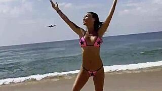 monika fox flaunts her pink bikini stars on the beach posing sexy