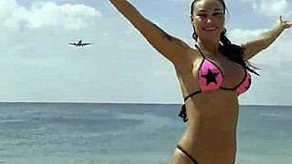 monika fox flaunts her pink bikini stars on the beach posing sexy