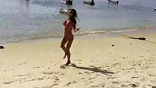 monika fox flaunts her pink bikini stars on the beach posing sexy
